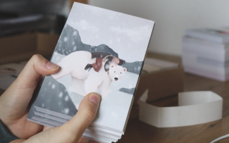 Juna and the bear postcard