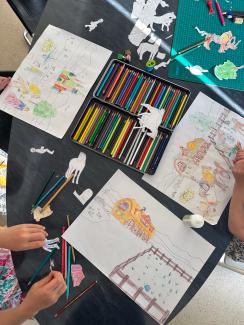 three girls while drawing 