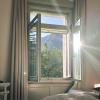 morning light, hotel room, sun shining through the window in a swiss historic hotel